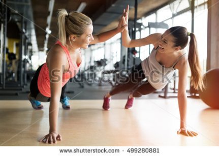 stock-photo-beautiful-women-working-out-in-gym-together-499280881